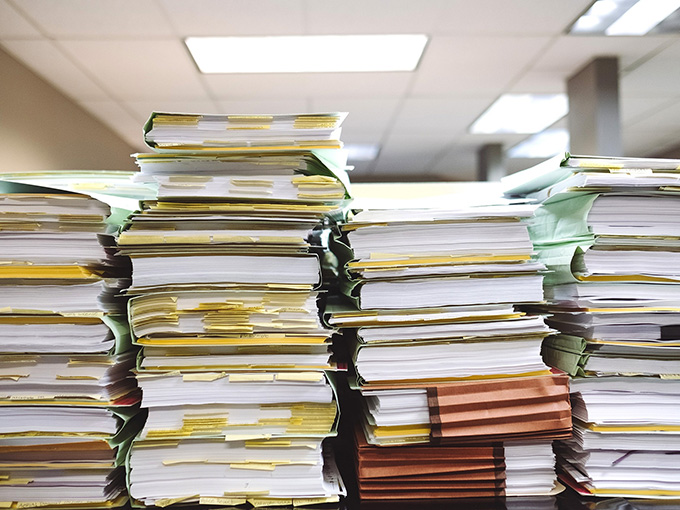 Stacks of paper invoices