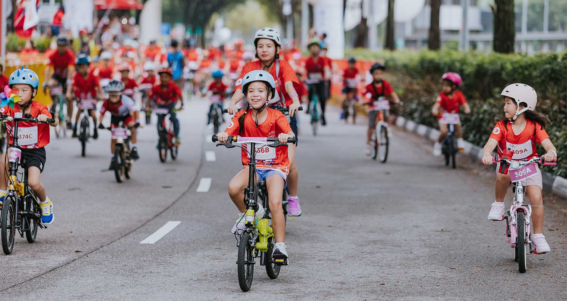 All smiles as young cyclists took to the closed roads of Stadium Drive. (Photo Credit: OCBC Cycle)