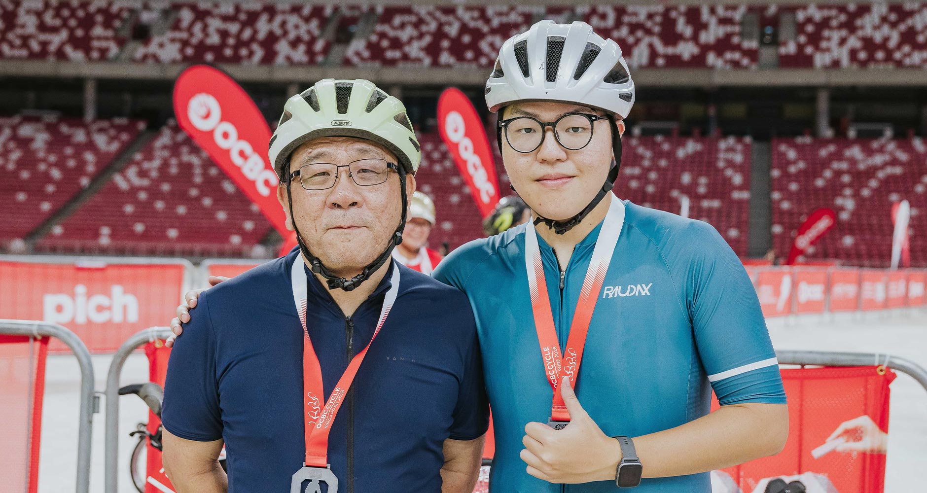 Mr Tan Ngee, 58 and Mr Wesley Tan, 23 took part together for the first time, with cycling becoming a new way for the pair to bond since 2019 (Photo credit: OCBC Cycle)