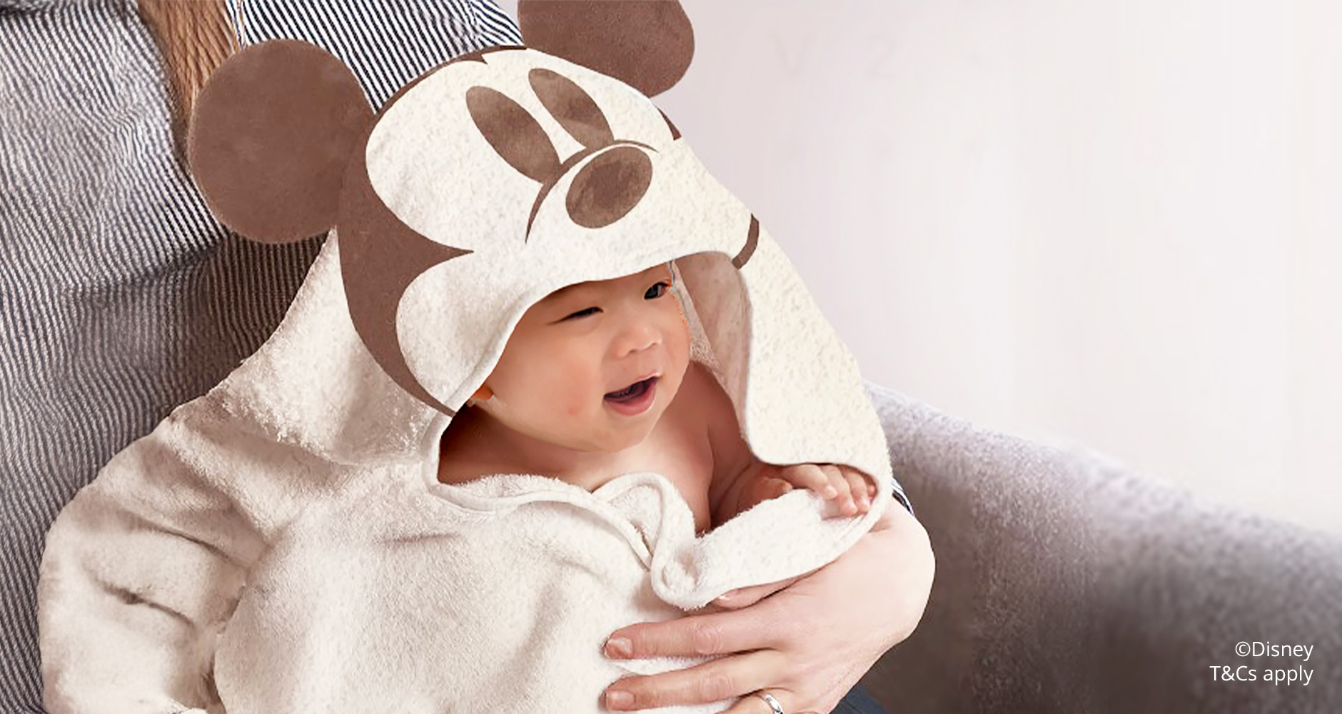 Get a Mickey Mouse-themed hooded towel with OCBC Child Development Account